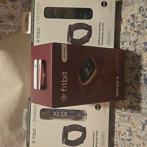 Fitbit Smartwatch Versa 4 with Two Bands. All New Great Set.